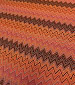 Black-orange glitter mesh knitted fabric with zigzag pattern for crafting and fashion projects