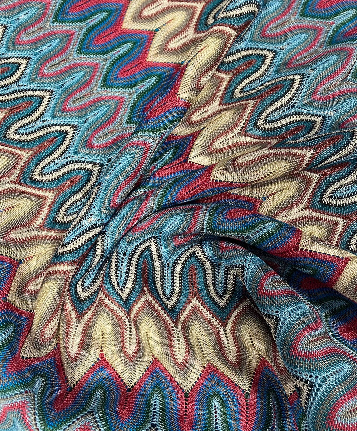 Luxury zigzag knit mesh fabric with colorful zigzag pattern and breathable texture for fashion and home decor projects