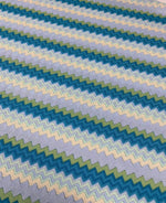 blue and white woven mesh fabric with zigzag pattern for crafting and upholstery