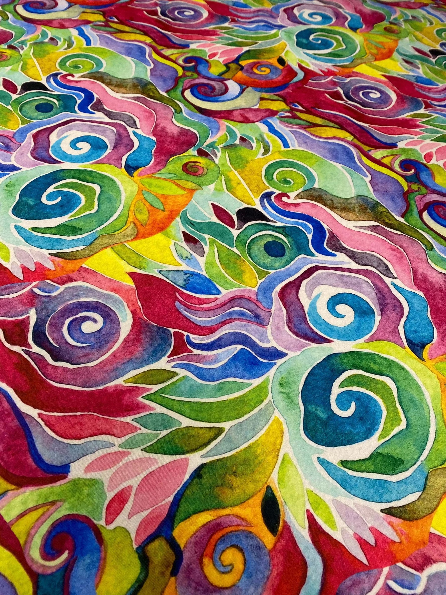 Colorful abstract floral swirl fabric with vibrant multicolor pattern and bold swirling shapes