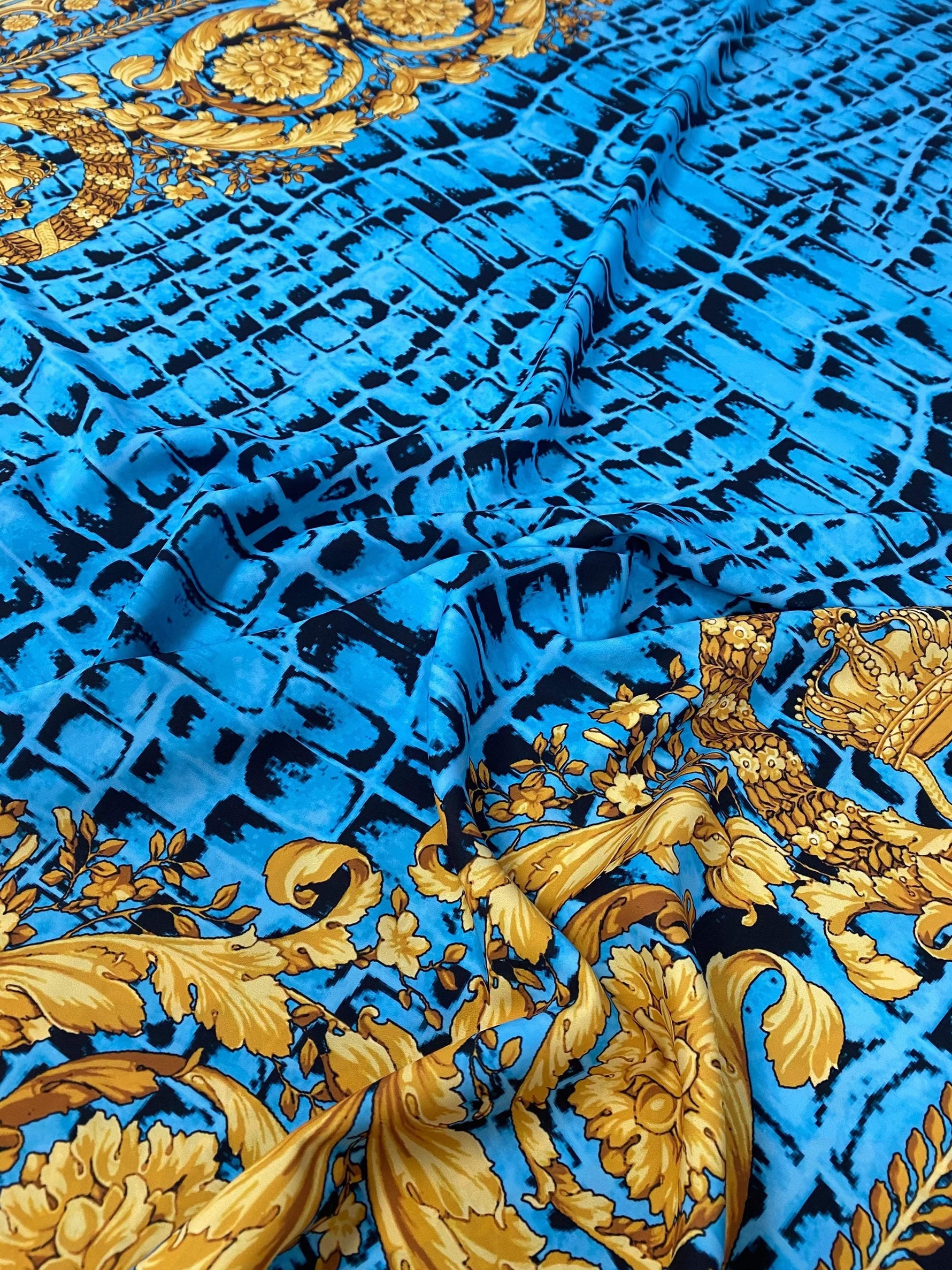 Turquoise snake skin fabric with gold baroque pattern for stylish designs