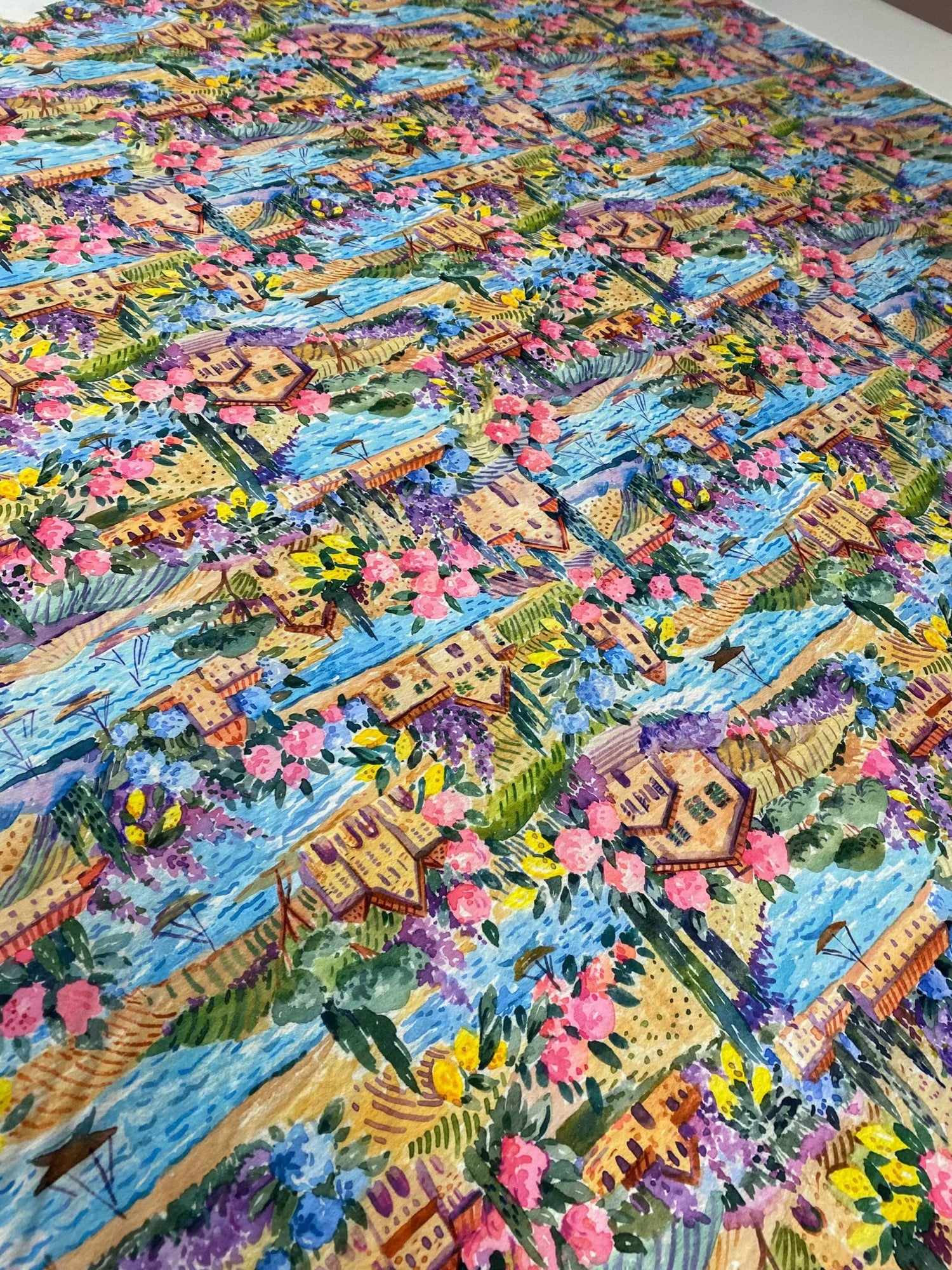 Watercolor Coastal Village Print Fabric featuring colorful seaside village and floral design in soft tones