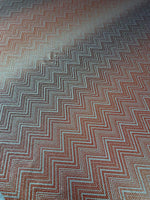 Gold Lurex striped metallic chevron pattern fabric with 4-way stretch and shimmering finish