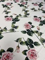 Pink rose floral fabric with green leaves on white background, 150cm width, elegant sewing material