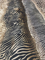 Metallic animal print Lurex fabric with gold shimmer and 4-way stretch spandex blend