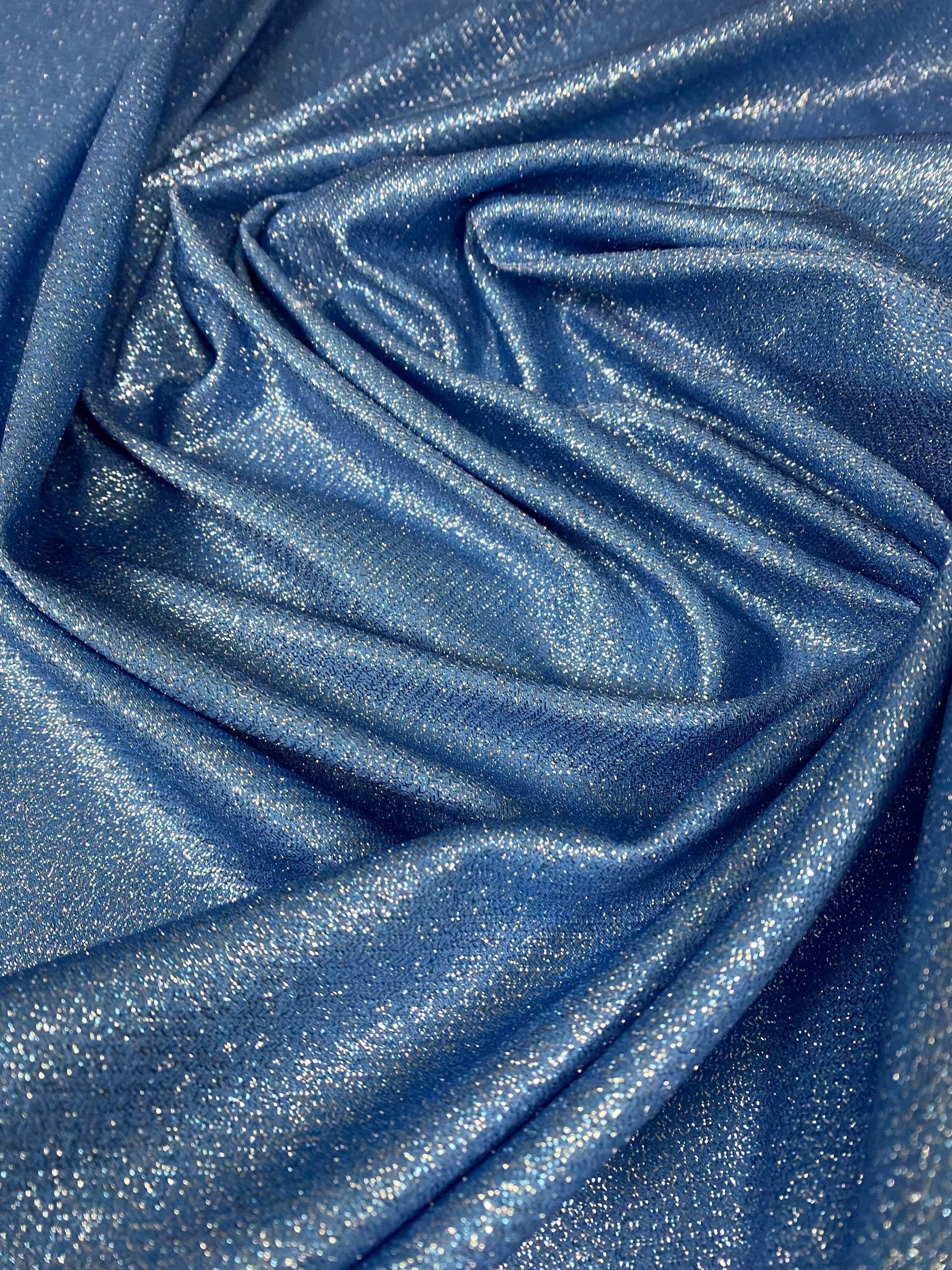 Sky blue glitter lurex fabric with shimmering glitter and 4-way stretch spandex blend