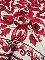 Red Baroque pattern linen fabric with intricate red floral design on white background for upholstery and crafts