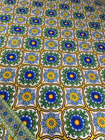 Floral design upholstery fabric with vibrant blue, green, and yellow patterns ideal for elegant home décor projects