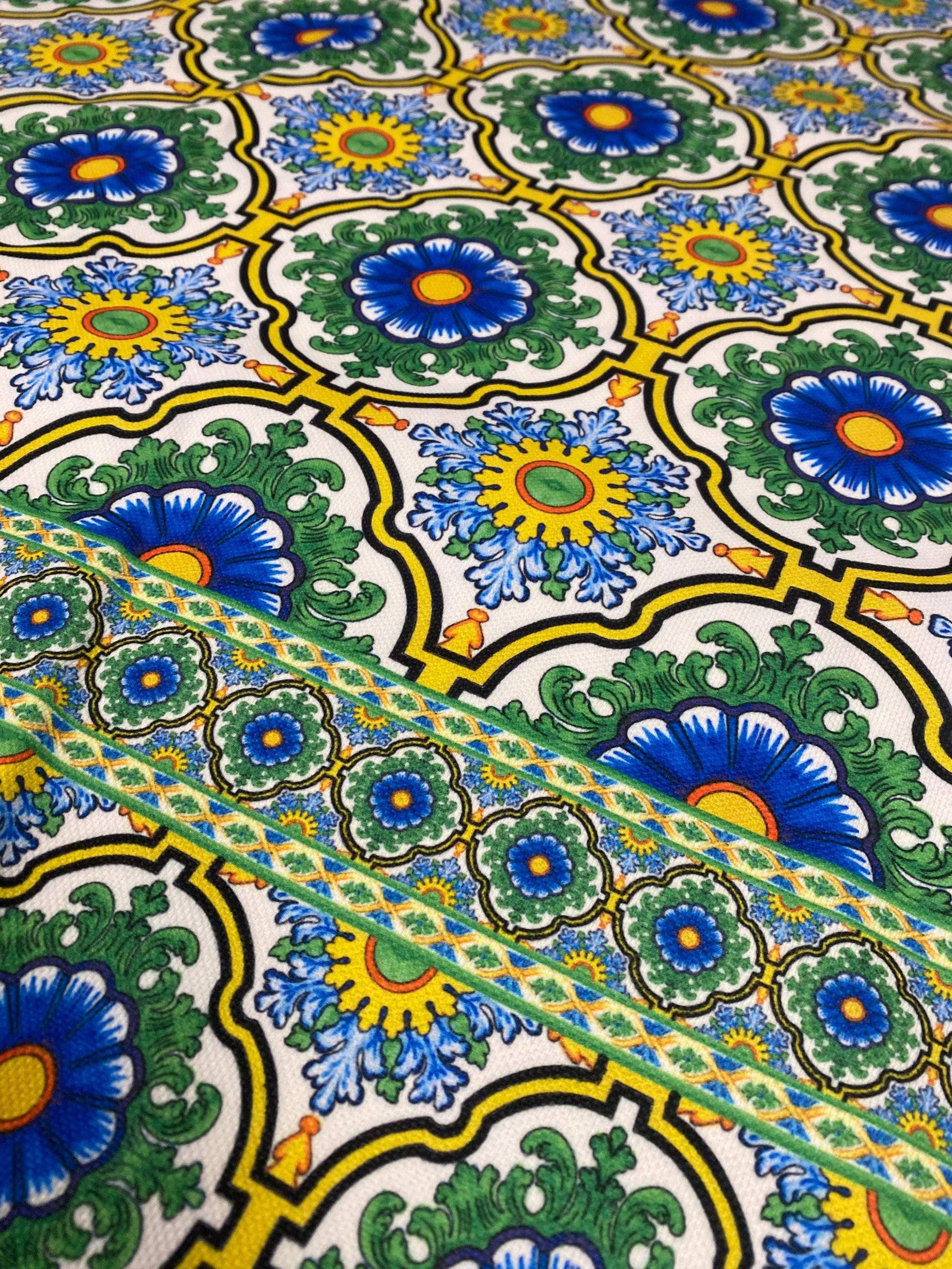 Floral design upholstery fabric with blue, green, and yellow intricate patterns for elegant home décor