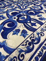 Close-up of Büyük Mojalica Design blue and white patterned upholstery fabric with intricate floral and swirl motifs