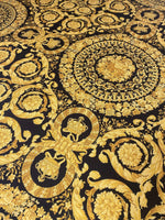 Barok Design Upholstery Fabric with intricate elegant gold floral patterns on black background for home décor