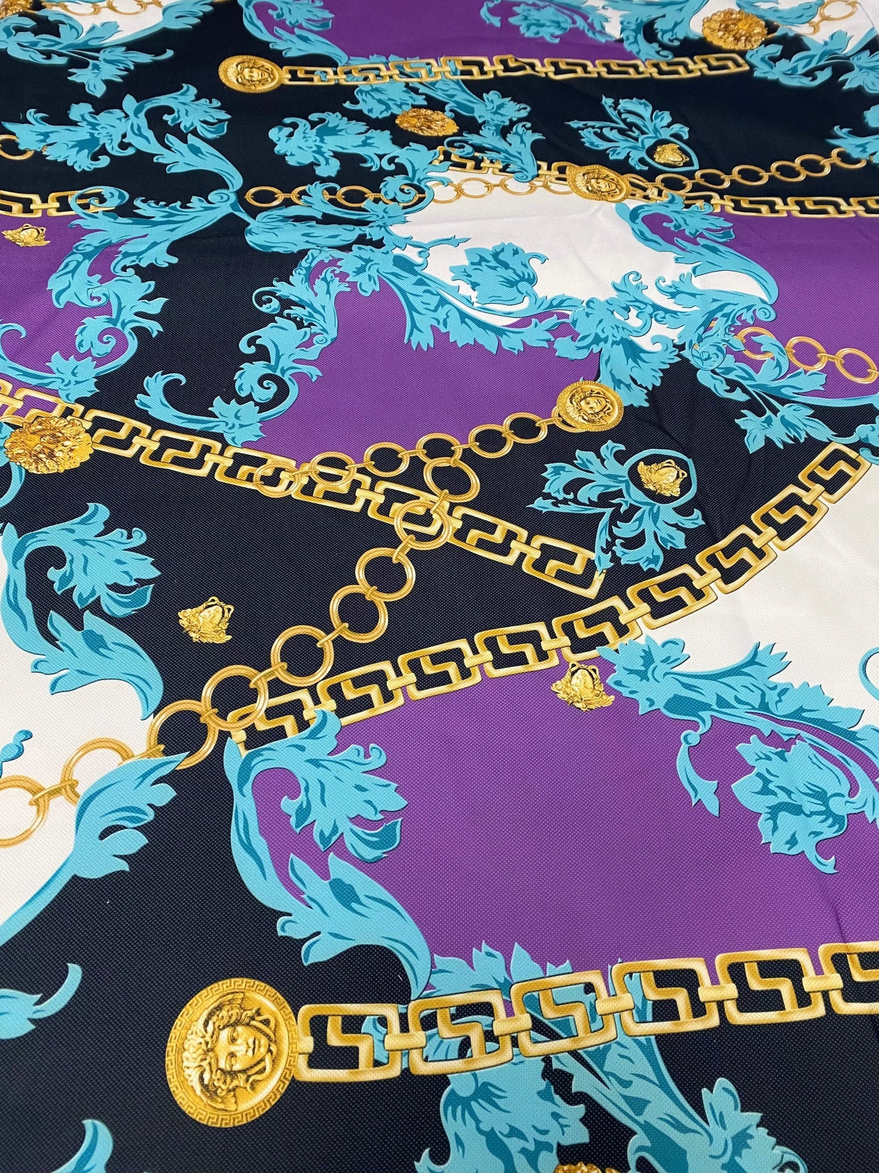 Barok Zincir Design upholstery fabric with elegant gold chain and turquoise floral patterns on purple and black background