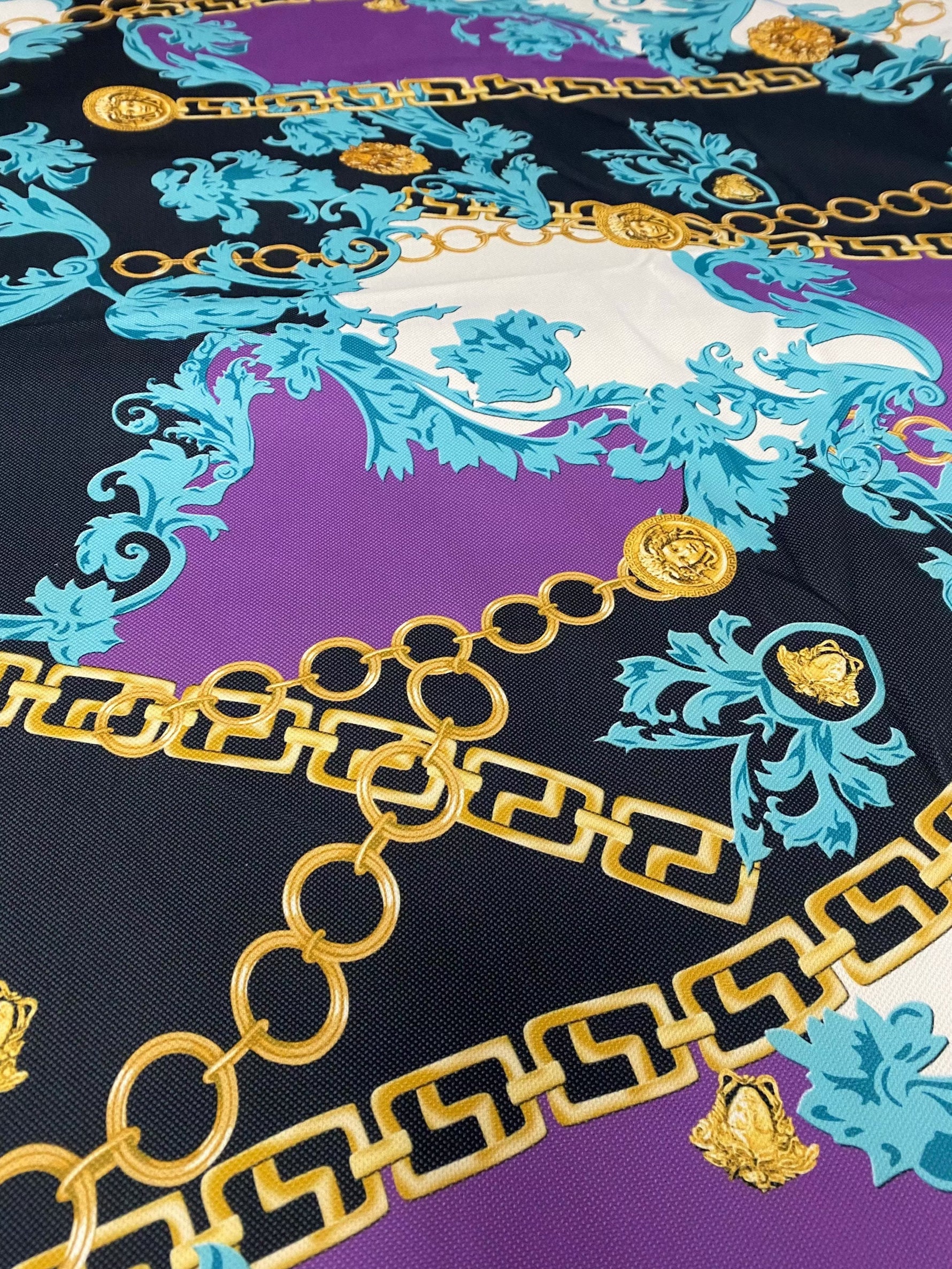 Barok Zincir Design upholstery fabric with ornate gold chain and floral motifs on purple and black background, 100% polyester for elegant home décor
