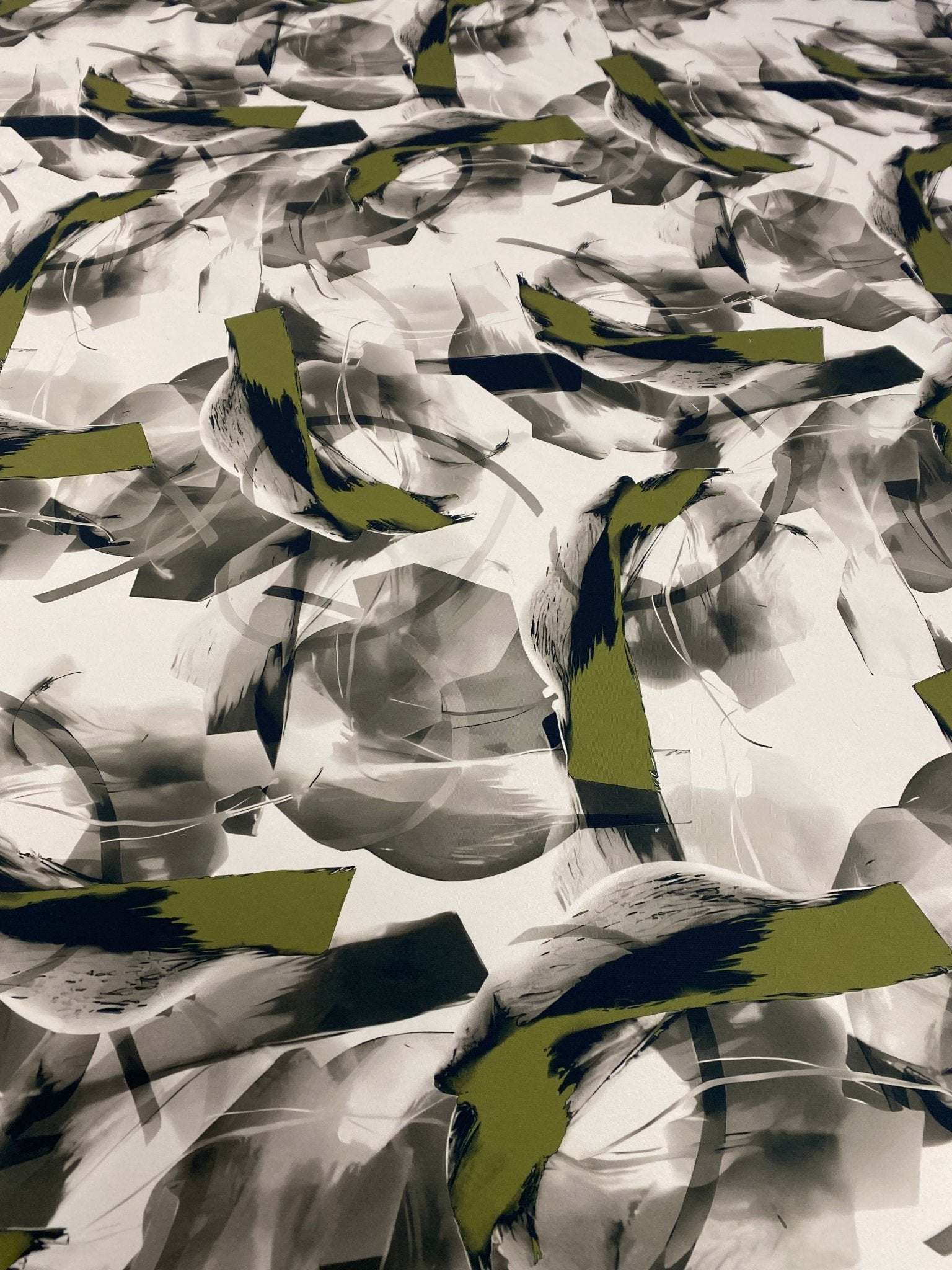 Abstract artistic brushstroke fabric with contemporary green and black print, 150cm wide, sold by the yard for creative projects