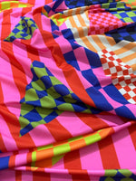 vibrant multicolor abstract geometric fabric with bold shapes and bright colors ideal for quilting and crafting projects