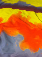 Abstract watercolor fabric with vibrant orange, yellow, and purple artistic design, 150cm width textile
