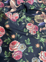 Angel Floral Print Fabric with detailed roses and cherub designs on dark background for sewing and quilting projects