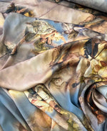 Soft fabric with detailed angel and floral print for sewing and crafting projects