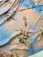 Angel print sky blue fabric with whimsical cloud and angel design, soft texture, 150cm width