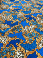 Blue Baroque Leopard Print Fabric with gold ornate designs and high-quality material for sewing projects