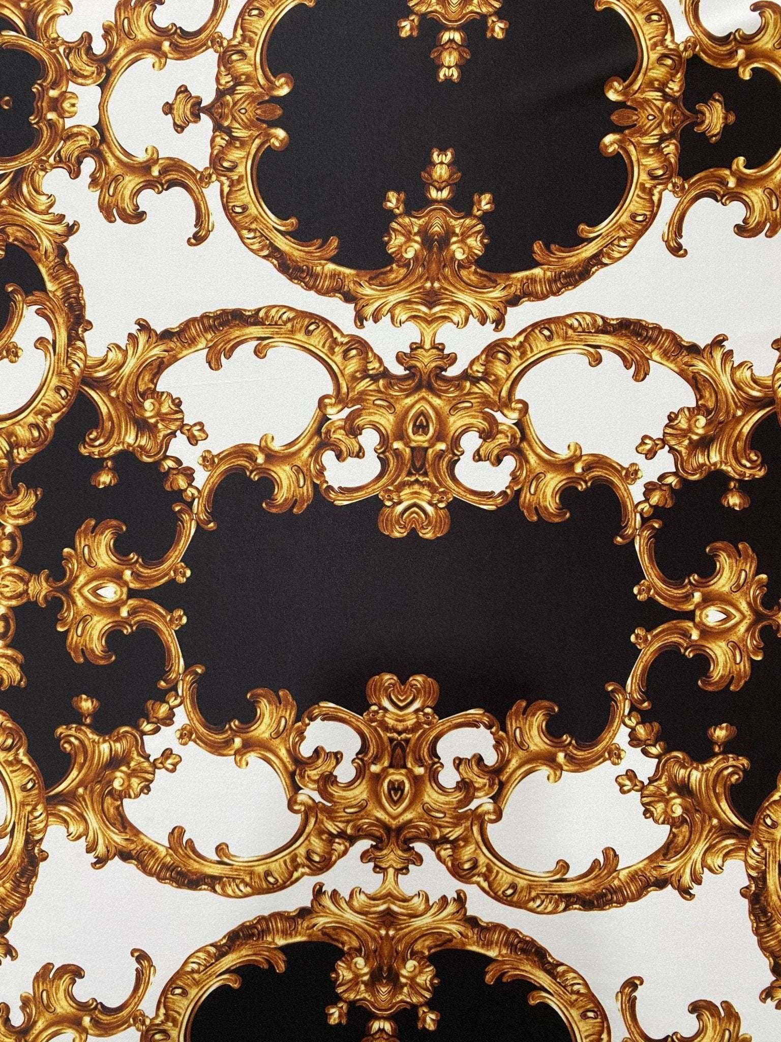 Baroque patterned fabric with black, white, and gold ornate design for elegant crafts