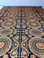 Baroque black and gold fabric with intricate ornate circular patterns, 150cm wide textile suitable for upholstery and fashion projects