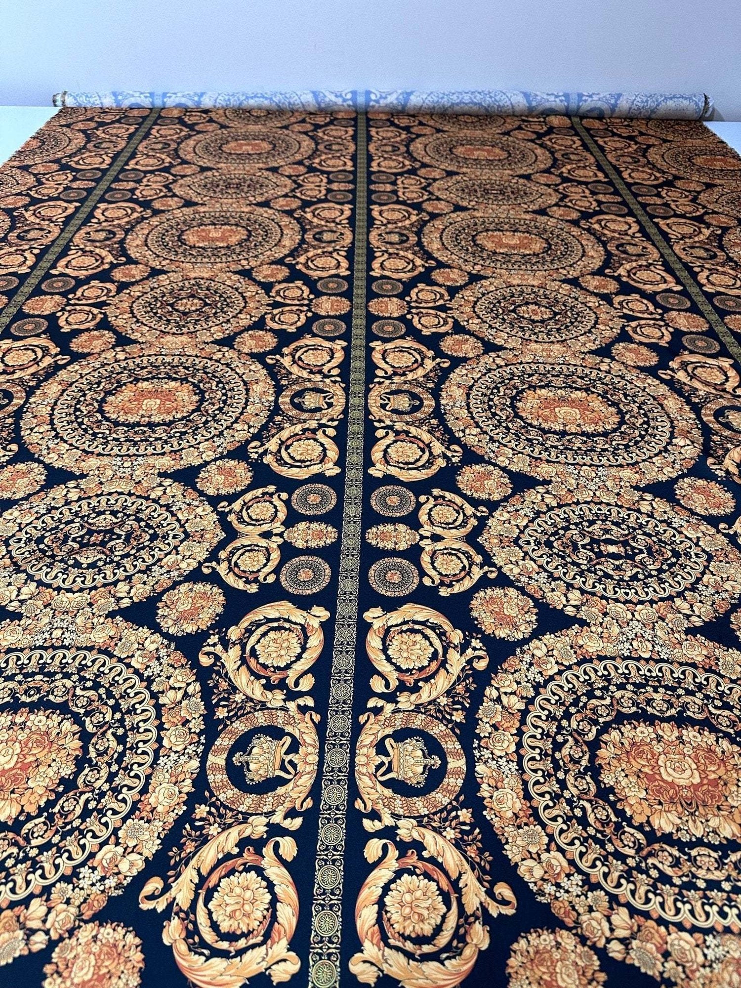 Baroque black and gold fabric with intricate ornate circular patterns, 150cm wide textile suitable for upholstery and fashion projects