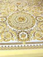 Baroque gold and white fabric with intricate elegant patterned design ideal for upholstery and drapery projects