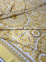 Baroque gold and white fabric with intricate ornate pattern suitable for upholstery and drapery projects