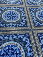 Navy blue baroque fabric with intricate Greek key and floral patterns in a luxurious design