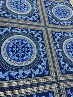 Navy blue baroque fabric with Greek key and ornate circular patterns for upholstery and drapery projects