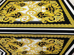 Baroque Silky Crepe Fabric with intricate gold and black ornate pattern on white background, 150cm wide textile for sewing projects