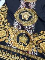 Baroque Leopard Fabric with gold baroque motifs and leopard print on black background