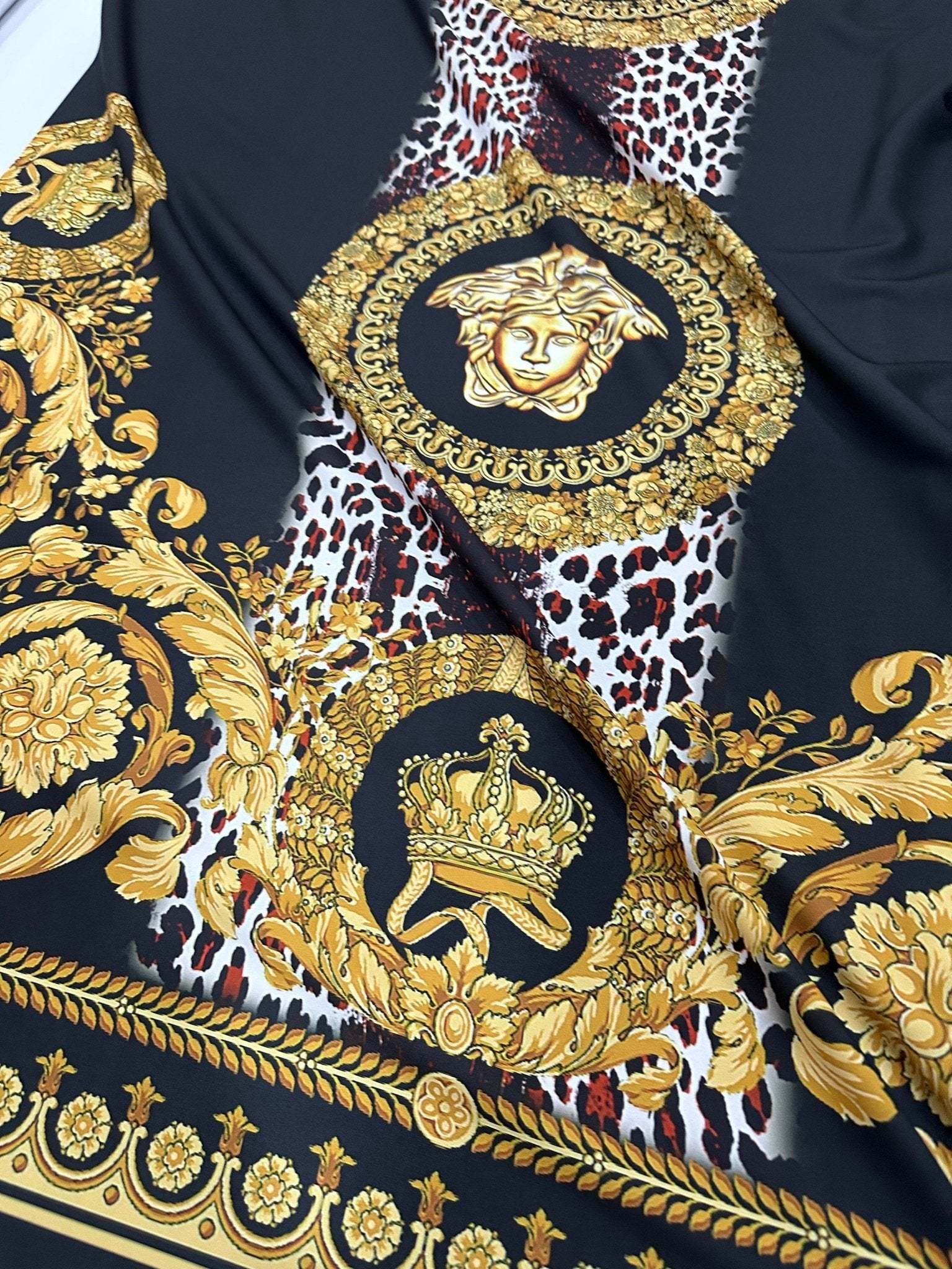 Baroque Leopard Fabric with gold baroque motifs and leopard print on black background