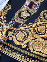 Baroque Leopard Fabric with luxurious gold baroque patterns and leopard print on black background