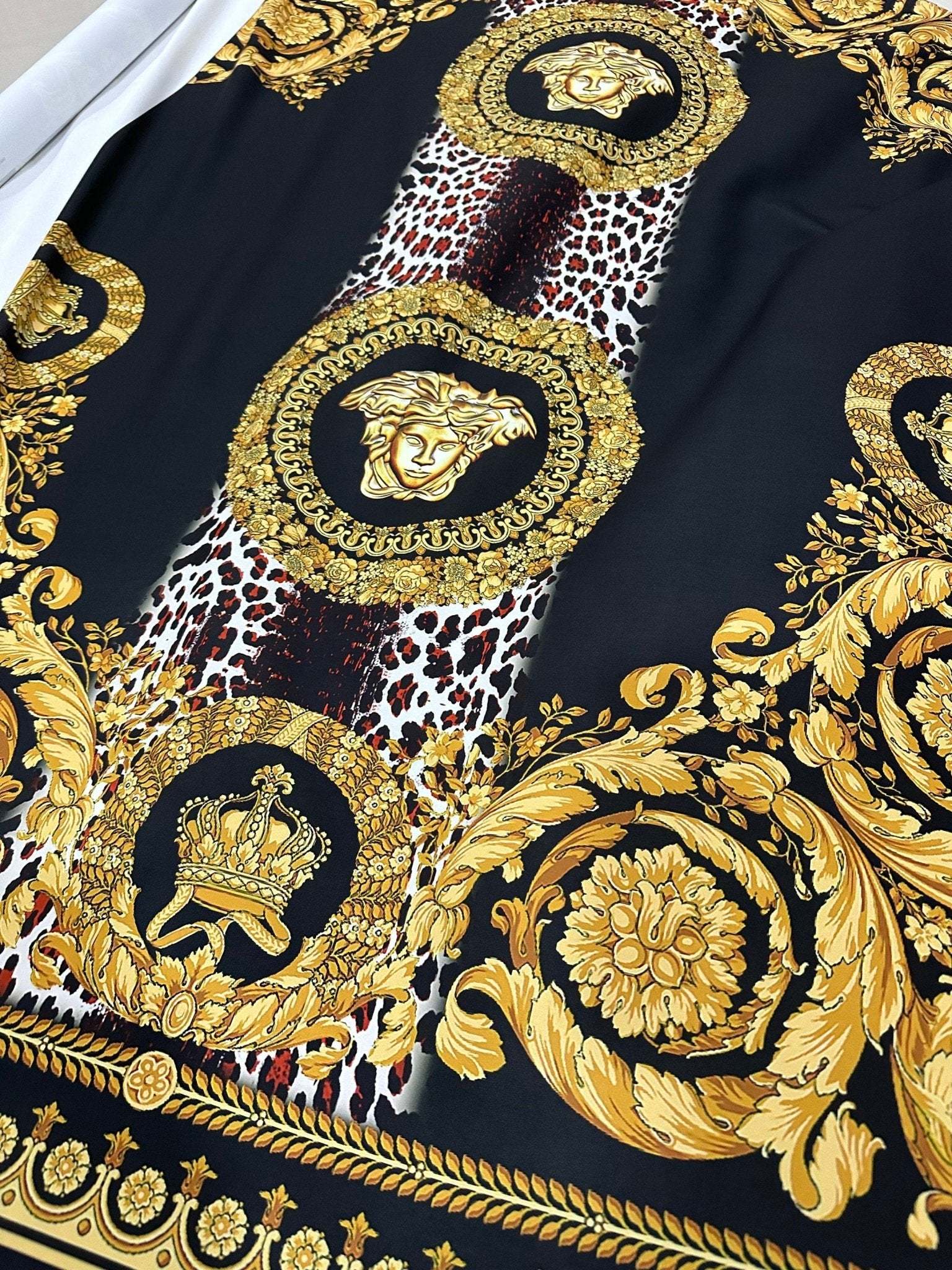 Baroque Leopard Fabric with luxurious gold baroque and leopard print design on black background