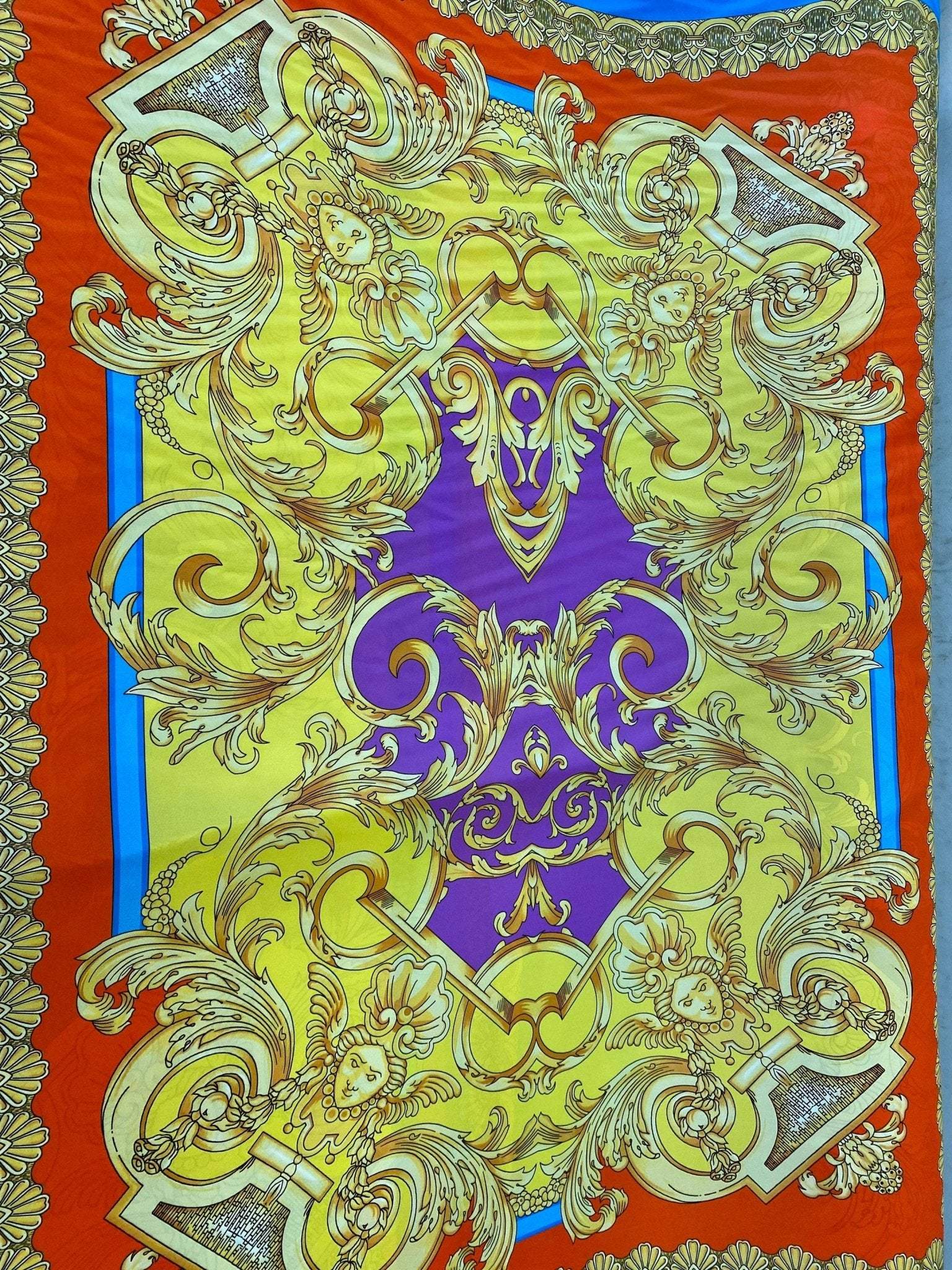 Baroque pattern silky crepe fabric in vibrant orange, blue, and yellow with intricate gold designs and silky texture, 150x100cm panel