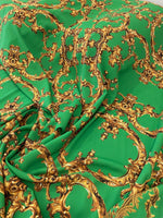 Baroque green and gold print fabric with intricate baroque design for upholstery and decor