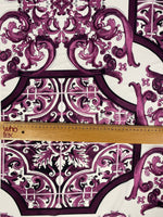 Baroque style purple ornamental print fabric with intricate design and ruler for scale