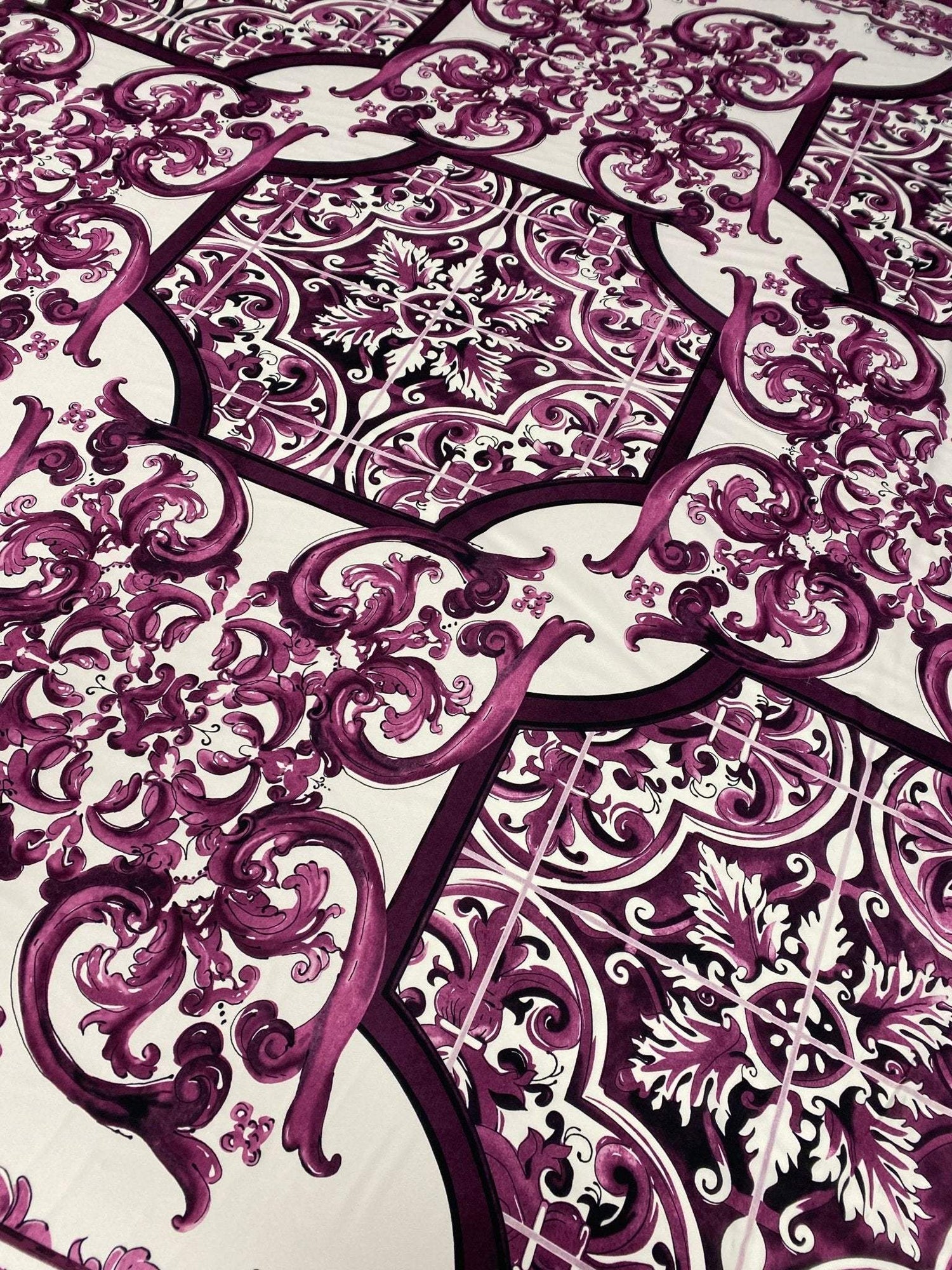 Baroque style purple ornamental print fabric with intricate elegant design and rich color, ideal for sewing and home decor projects