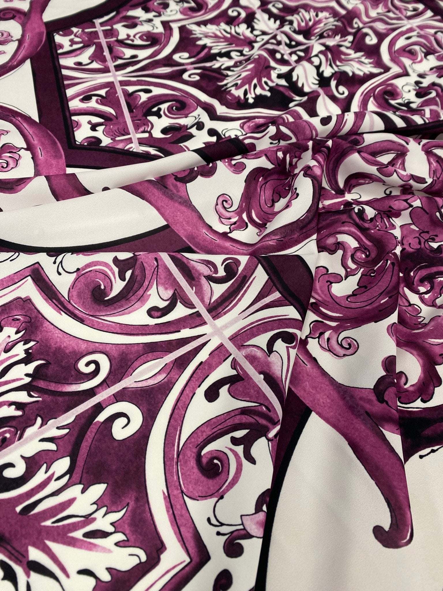 Baroque style purple ornamental print fabric with intricate decorative pattern and elegant design