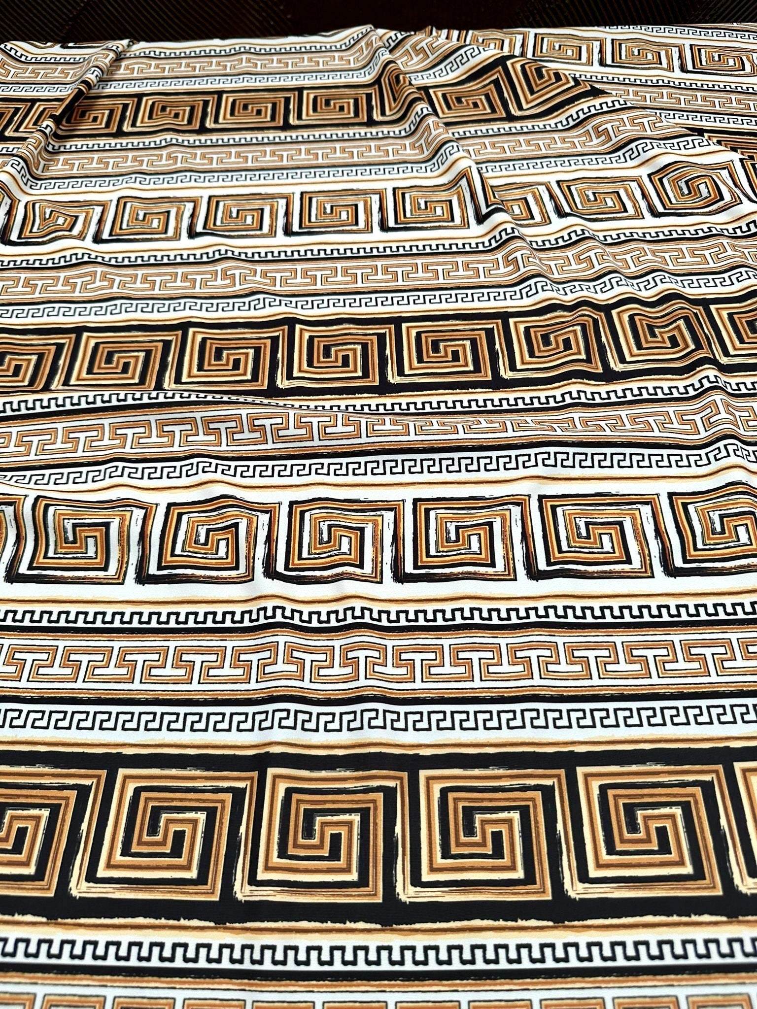 Beige brown silky crepe fabric with geometric and Greek key pattern designs