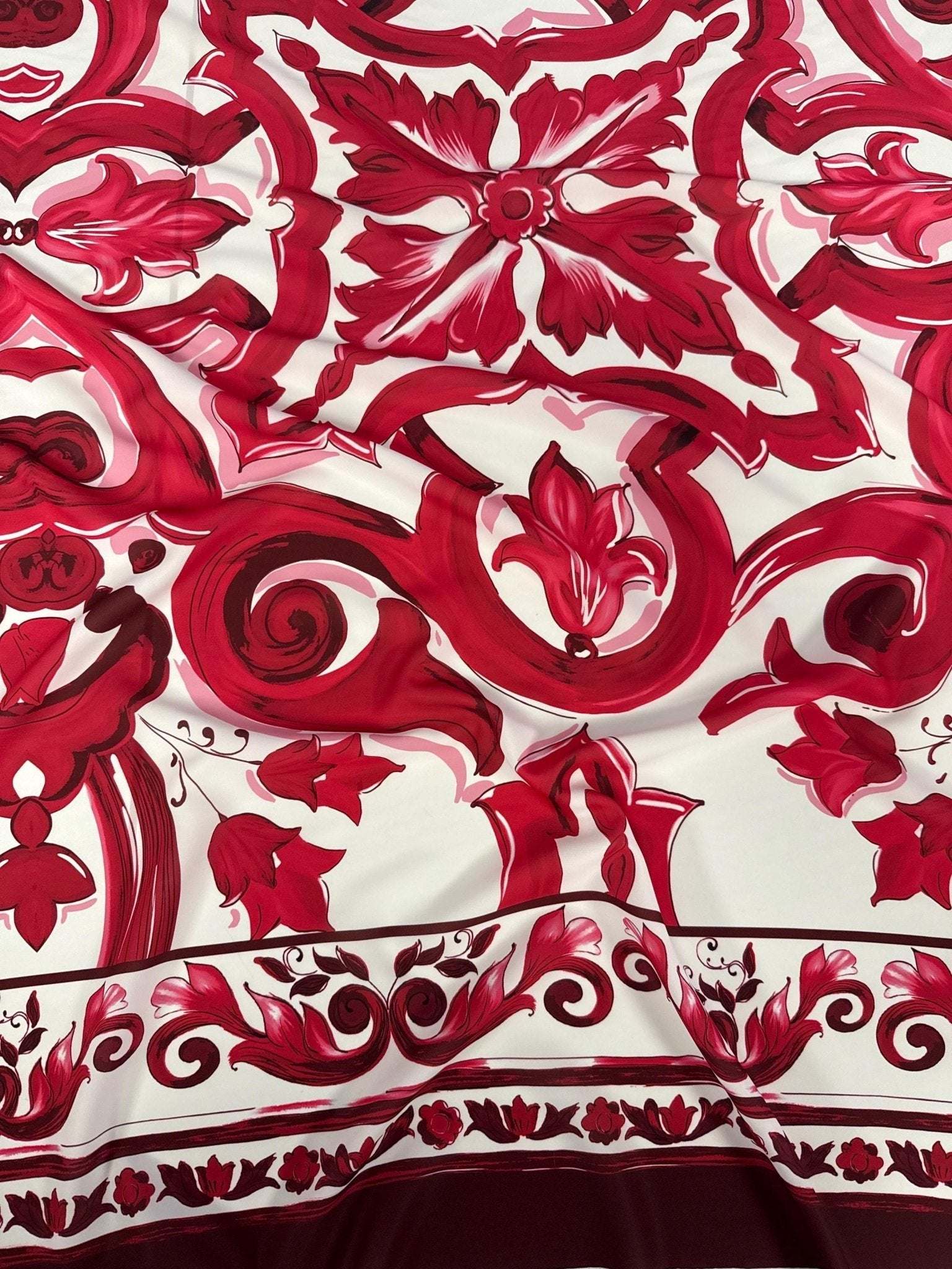Red fabric with bold Big Majolica pattern inspired by Sicilian design, vibrant magenta red, 150cm width