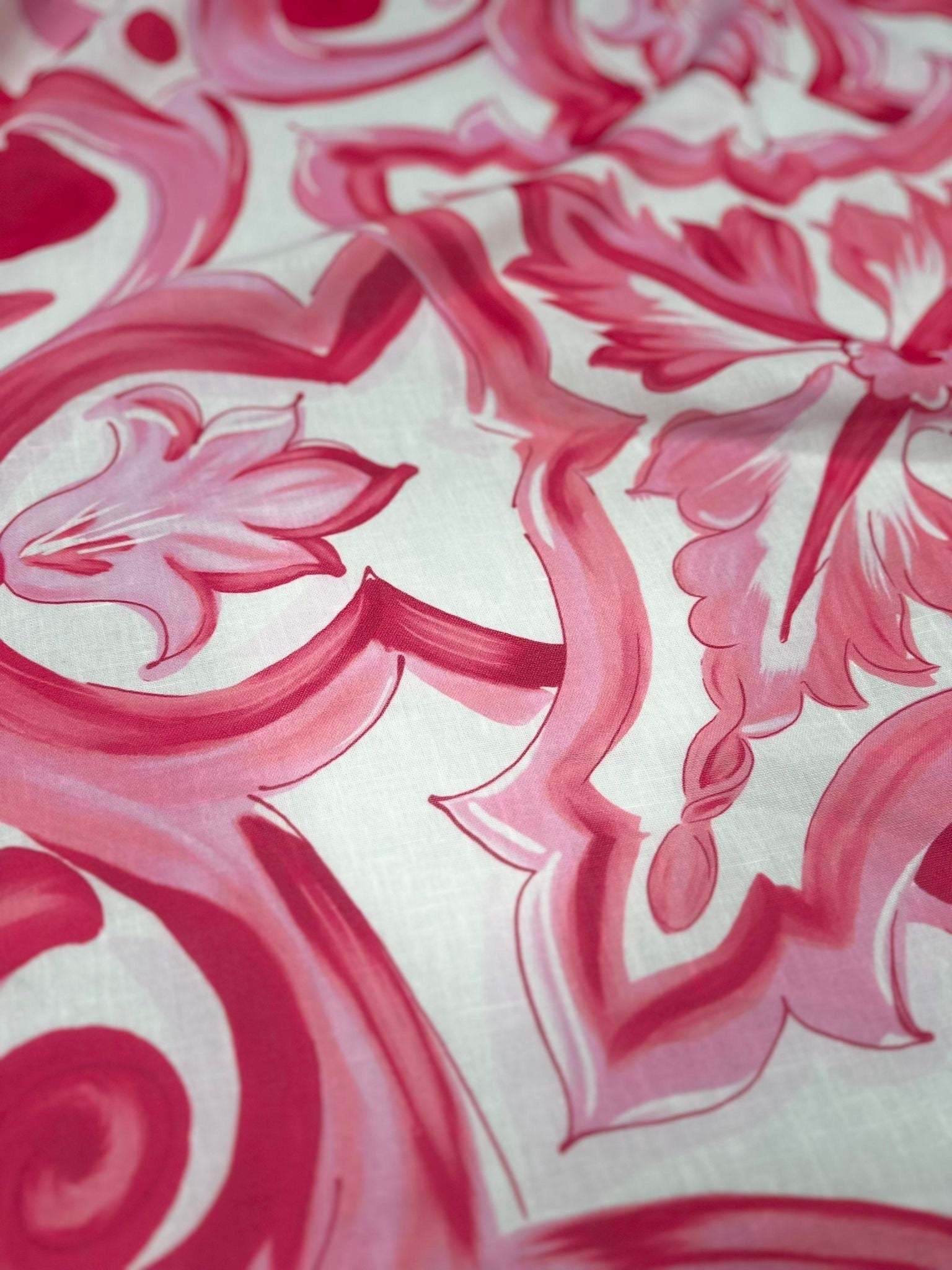 Close-up of pink and white Big Majolica pattern fabric with Sicilian floral design