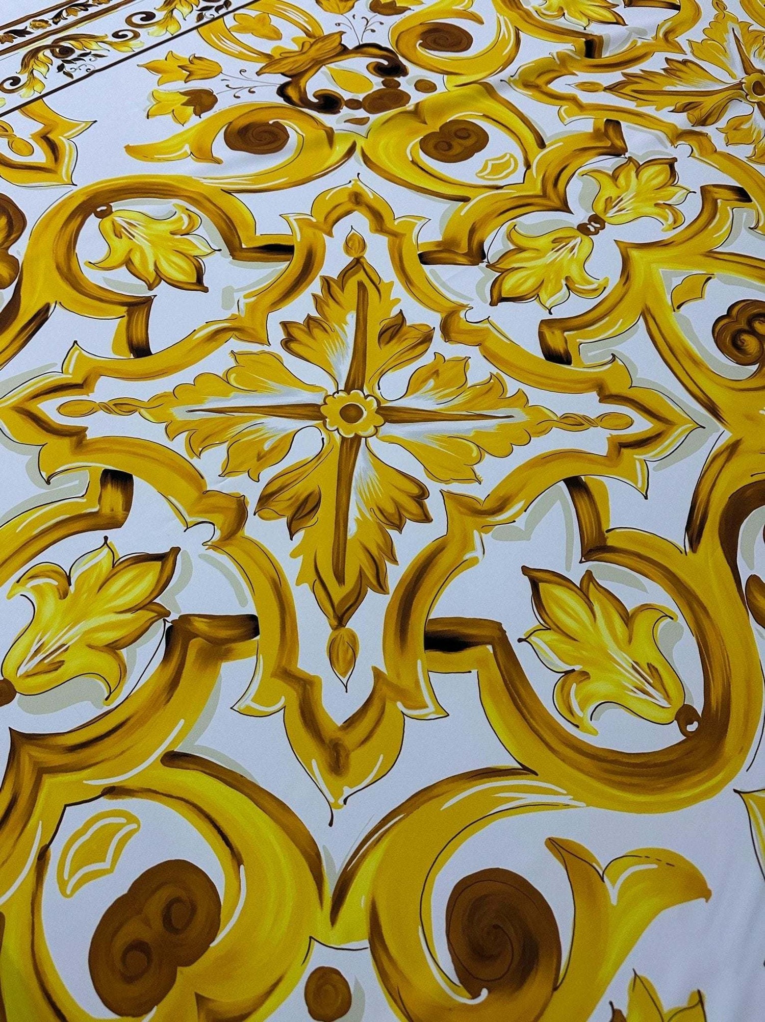 Yellow Big Majolica pattern fabric with vibrant Sicilian floral and geometric design on white background