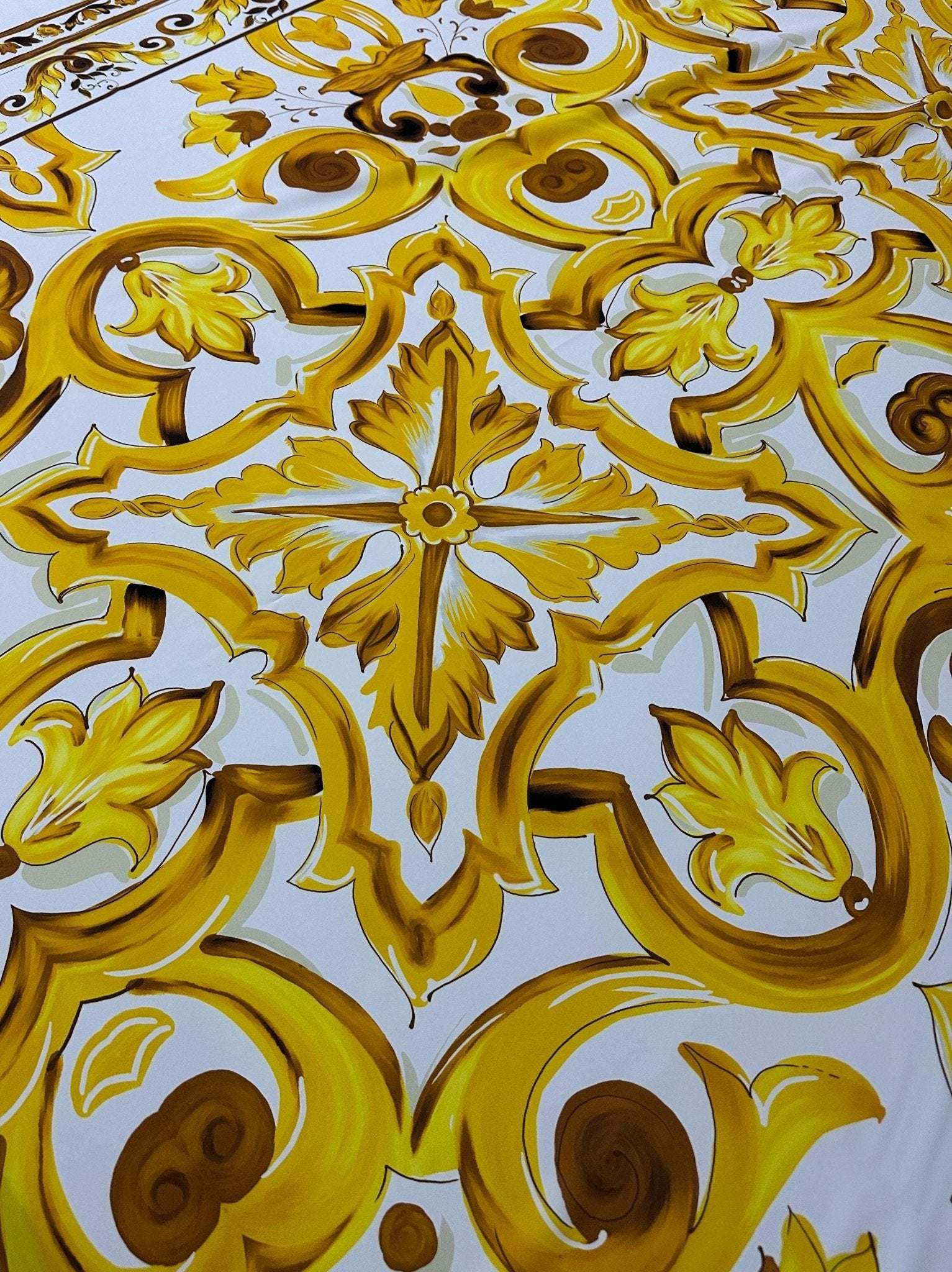 Yellow Big Majolica pattern fabric with vibrant Sicilian floral and geometric design on white background