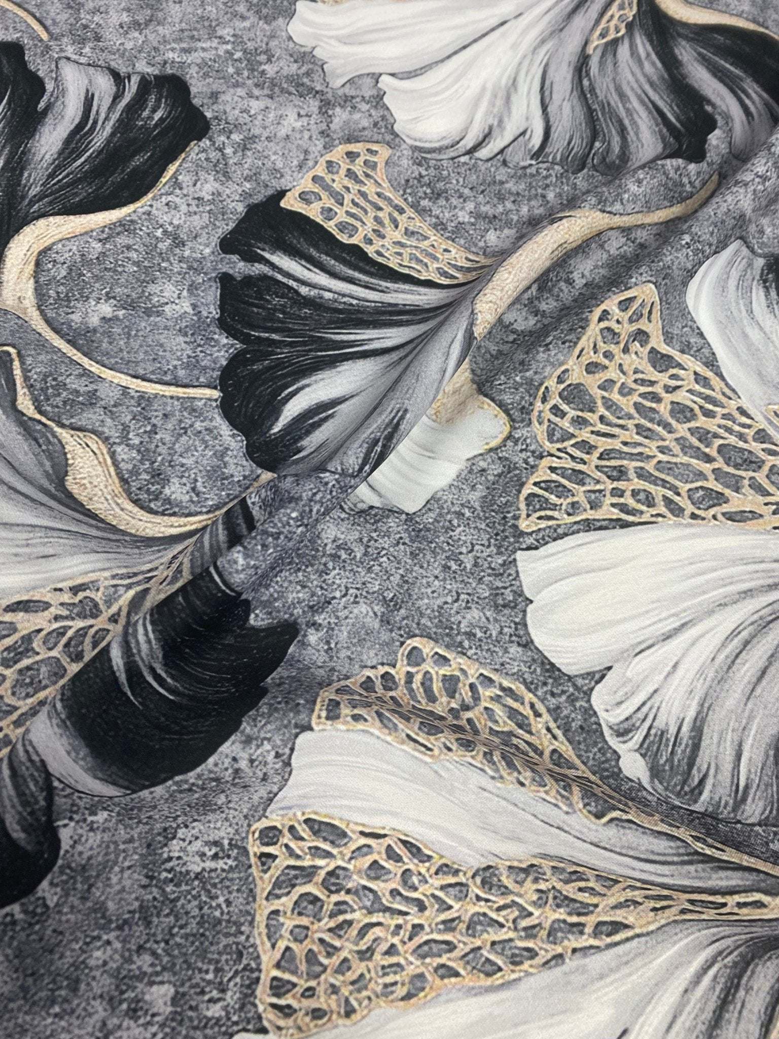 Black and white ginkgo leaf fabric with elegant gold vein botanical print on textured background