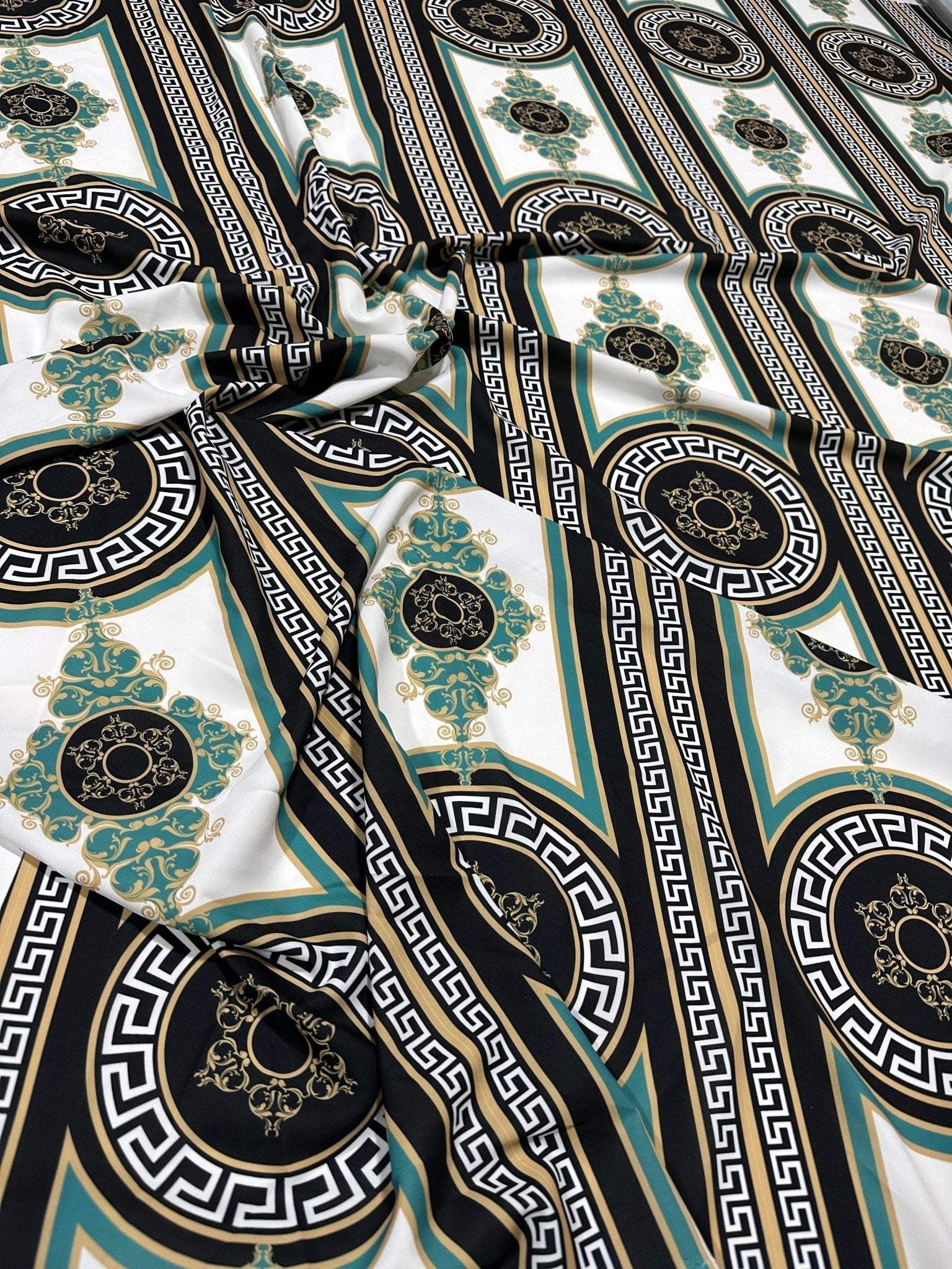 Greek Key Pattern Fabric with classic black, white, and gold geometric design, ideal for upholstery and drapery projects