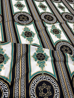 Greek Key Pattern Fabric with black, gold, and teal ornate geometric design on white background