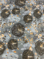 Blue grey fabric with stylized dandelion and floral print pattern